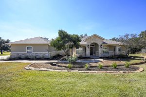 Front view of Hill Country home in Comal Trace